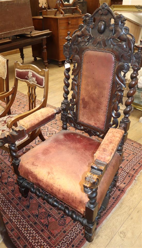 A late 19th century Flemish carved oak elbow chair